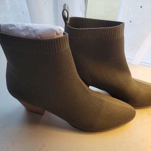 Low heel bootie in olive fabric upper. Never worn. NWOT